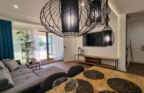 Elk Apartment | Explore Lazur Lake: Ocean Views & Family-Friendly Amenities