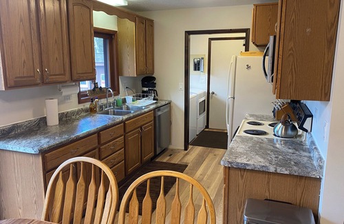 Cadillac House | Top-Rated Lazy Acorn "The Yellow Perch" on Lake Mitchell