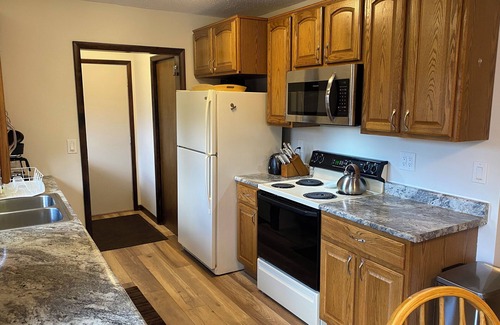 Cadillac House | Top-Rated Lazy Acorn "The Yellow Perch" on Lake Mitchell