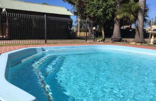 Lakes Entrance Apartment | Relaxing Lazy Acre Log Cabins with Pool & Ocean View