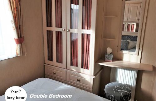 Hamworthy House | Relax at Lazy Bear with Oceanfront Pool & Spa Amenities
