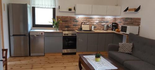 Sulecki Borek House | Discover Leśna Chata Kaszuby: Pet-Friendly Retreat Awaits