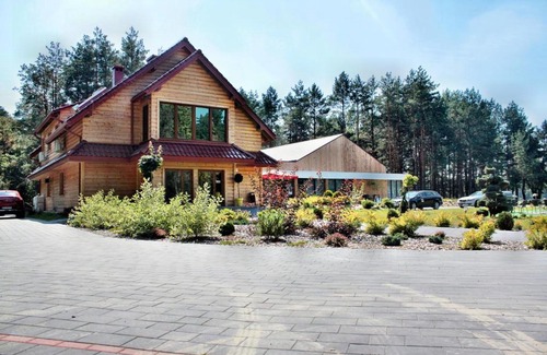 gmina Cieszanow Bed & Breakfast | Discover Leśna Chata: Family-Friendly with Pool & Breakfast
