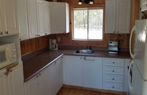 Saint-David-de-Falardeau Ski Chalet | Discover Le 550 Chalet Douillet with Spa and Hot Tub