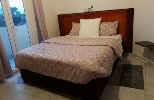 Douala House | Comfortable Stay at Le Buffle Noir in Douala with Breakfast