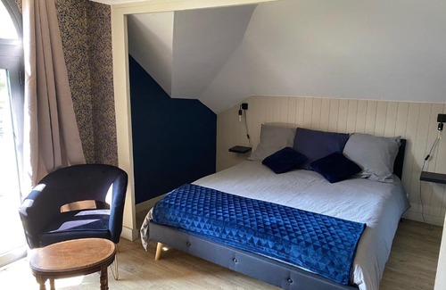 Brehemont Bed & Breakfast | Relax at Le Castel de Bréhémont with Oceanfront Pool Views