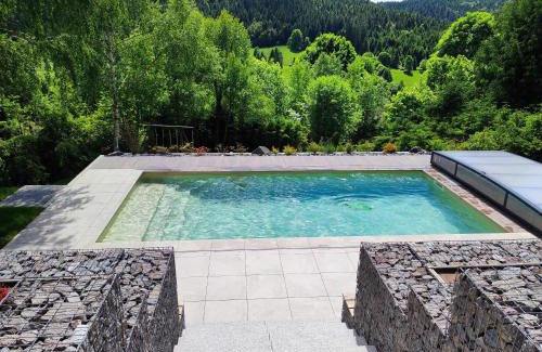 Le Grand Valtin Ski Chalet | Relax at Le Cerf: Pool, Ocean Views & High Guest Ratings