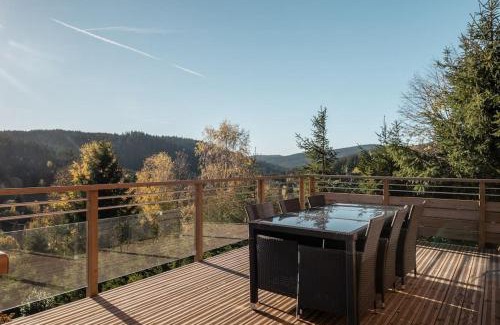 Le Grand Valtin Ski Chalet | Relax at Le Cerf: Pool, Ocean Views & High Guest Ratings