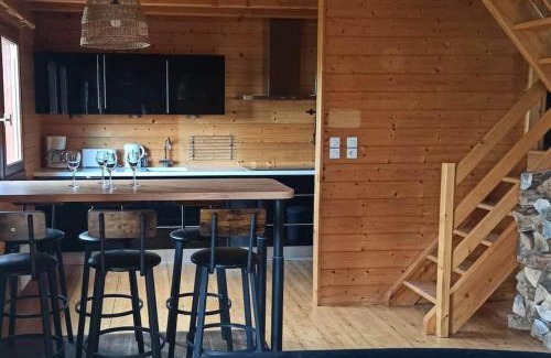 Plantades Ski Chalet | Relax at Le Chalet du Lac: Pool, Spa & Ocean Views