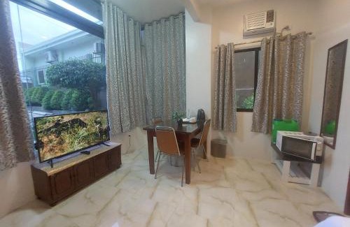 Taculing Apartment | Elegant Le Chateau Residences with Delicious Breakfast Included