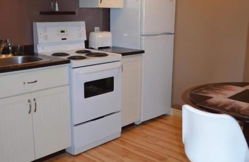 Rouyn-Noranda Apartment | Discover Comfort at Le Citadin with Spa & Breakfast Options