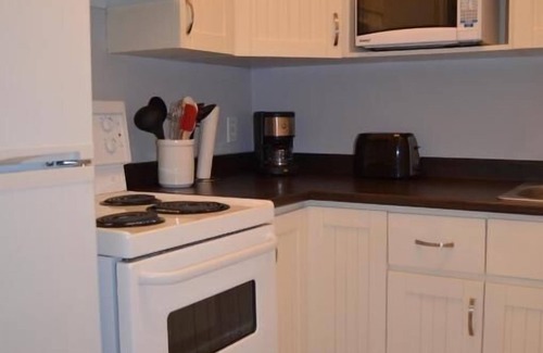 Rouyn-Noranda Apartment | Discover Comfort at Le Citadin with Spa & Breakfast Options