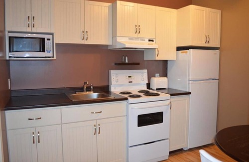 Rouyn-Noranda Apartment | Discover Comfort at Le Citadin with Spa & Breakfast Options