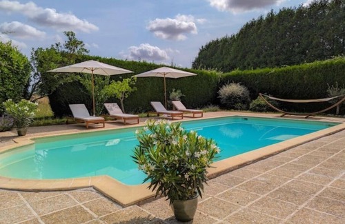 Josnes House | Relax at Le Clos de la Reine: Poolside Paradise Awaits