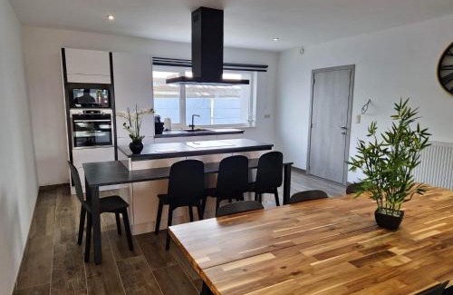 Baudour Apartment | Cozy Retreat: Pet-Friendly Haven with Great Guest Ratings
