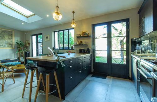 Old Town House | Experience Le Cordelier: Riverside Retreat with Ocean Views