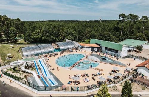 Leon Apartment | Relax at Le Cottage Vue Lac with Pools and Scenic Views