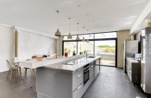 Centre Historique Apartment | Elegant Penthouse at Le Couvent des Ursulines with Pool