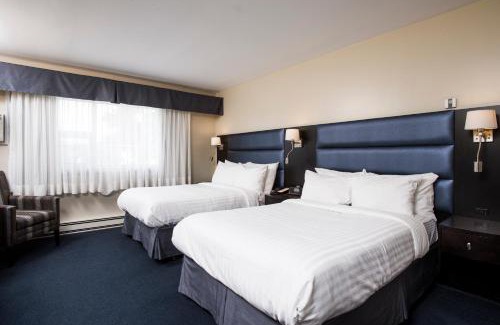 Rouyn-Noranda Hotel | Discover Comfort at Le Deville par G5 with Hot Tub Access