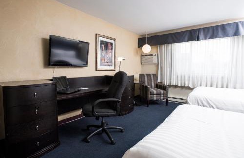 Rouyn-Noranda Hotel | Discover Comfort at Le Deville par G5 with Hot Tub Access