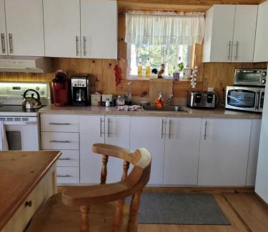 Saint-David-de-Falardeau Bed & Breakfast | Ocean View Stay at Le Gîte Du Gardien Blanc - Family Friendly