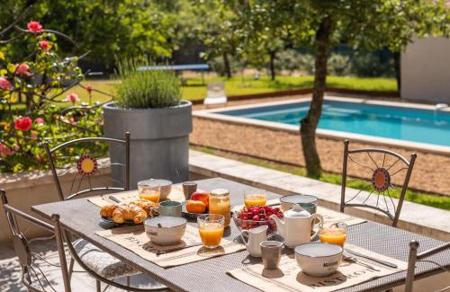 Croagnes House | Relax at Le Jardin des Delis: Pool & Oceanfront Views