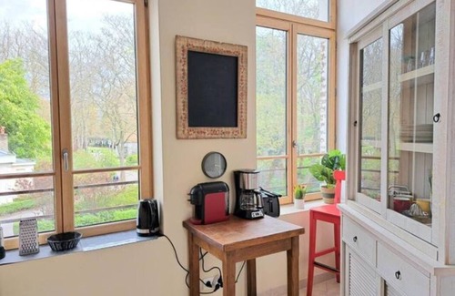 Gare Apartment | Le Jules Verne: Central Location with Spa & Sauna Access