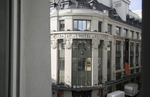 Saint-Gervais Apartment | Elegant Le Marais Notre Dame: Family-Friendly Getaway