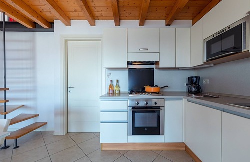 Pulciano Apartment | Relax at Le Olive Apartment with Pool & Lake View
