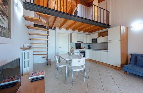 Pulciano Apartment | Relax at Le Olive Apartment with Pool & Lake View