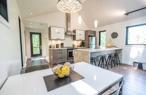 Sainte-Emelie-de-L'Energie Ski Chalet | Relaxing Retreat at Le Pik-Bois with Spa & Lake Views