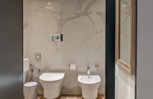 Poetto House | Indulge at Le Palmette Suites with Oceanfront Amenities