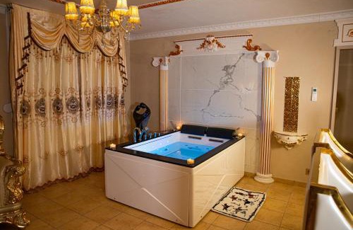 Vernon Apartment | Indulge in Relaxation at Le Petit Versailles with Spa & Hot Tub
