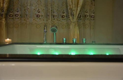 Vernon Apartment | Indulge in Relaxation at Le Petit Versailles with Spa & Hot Tub