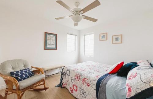 Val-Comeau Bed & Breakfast | Explore Le Phare des Dunes with Oceanfront Views