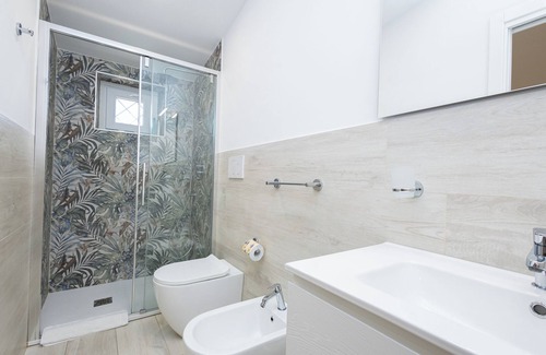 Zona XXX Castel Fusano Apartment | Discover Le Querce: Family-Friendly Retreat in Rome