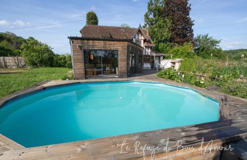 Arnieres-sur-Iton House | Discover Le Refuge du Bois d'Amour: Family-Friendly Getaway