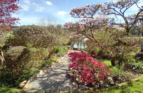 Loperec House | Relax at Le spa du Goaquer with Inviting Hot Tub Amenities