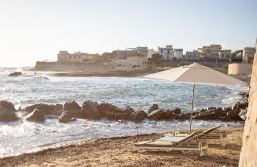 Civitavecchia Apartment | Discover Oceanfront Comfort at Le Suites sul Mare di Esterina