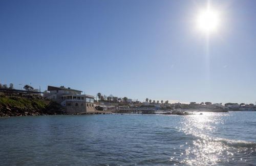 Civitavecchia Apartment | Discover Oceanfront Comfort at Le Suites sul Mare di Esterina