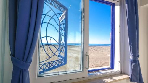Nettuno Apartment | Discover Le Tre Caravelle: Oceanfront Oasis for Families