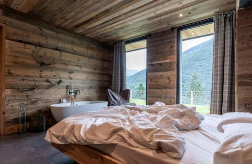 Pieve di Ledro Apartment | Experience Comfort at Ledarix Charm Chalet with Hot Tub