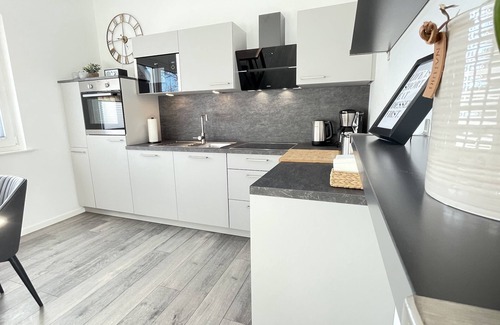 Wremen Apartment | Modern Oceanfront Apartment Steps from the Beach
