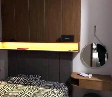 District 10 Apartment | Welcoming LeeVy Homestay KingDom with Pool & Family Fun