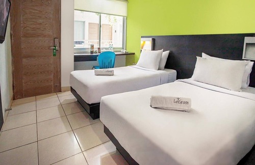 Bendungan Hilir Hotel | Discover LeGreen Suite Tondano: Family-Friendly Retreat