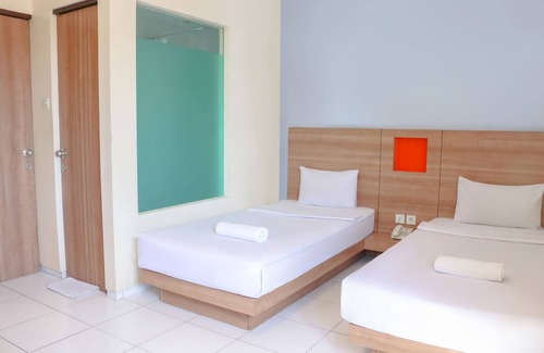 Ambon Hotel | Budget-Friendly LeGreen Suite Waihaong - Family Welcoming Stay