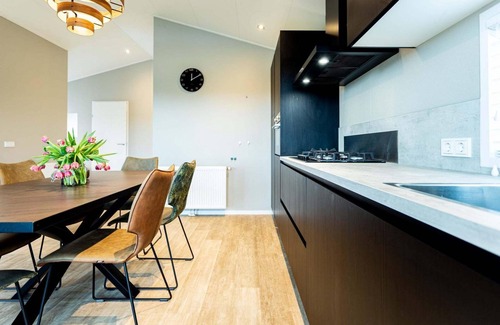 Berkhout Ski Chalet | Discover Leijhoeve at Park Westerkogge: Waterfront Retreat