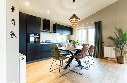 Berkhout Ski Chalet | Discover Leijhoeve at Park Westerkogge: Waterfront Retreat