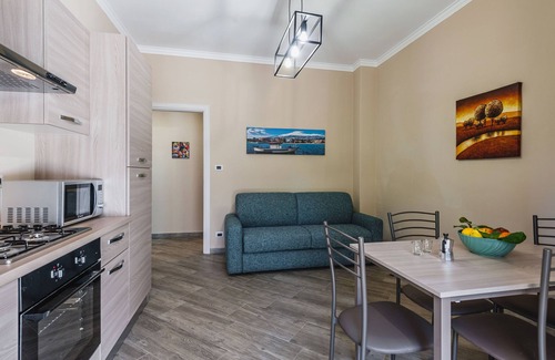 Giardini Naxos Apartment | Relax at Lemon Tree Apartments with Family-Friendly Amenities