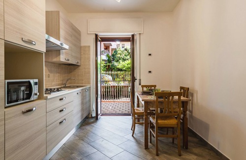 Giardini Naxos Apartment | Relax at Lemon Tree Apartments with Family-Friendly Amenities
